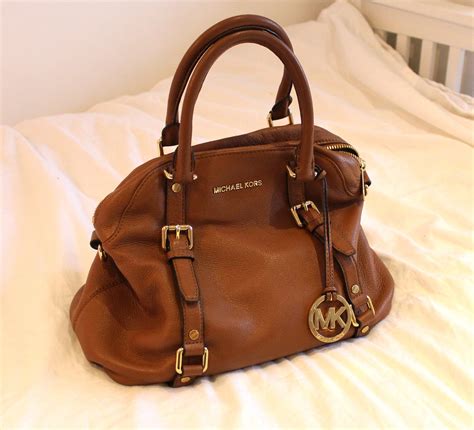 where to buy michael kors bags to resale|sell used michael kors bag.